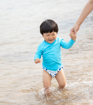 Costume Contenitivo con bottoni - M (7-13 kg)